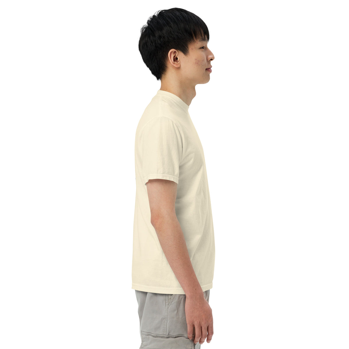Heavyweight T-shirt in light ivory, side profile with small chest graphic