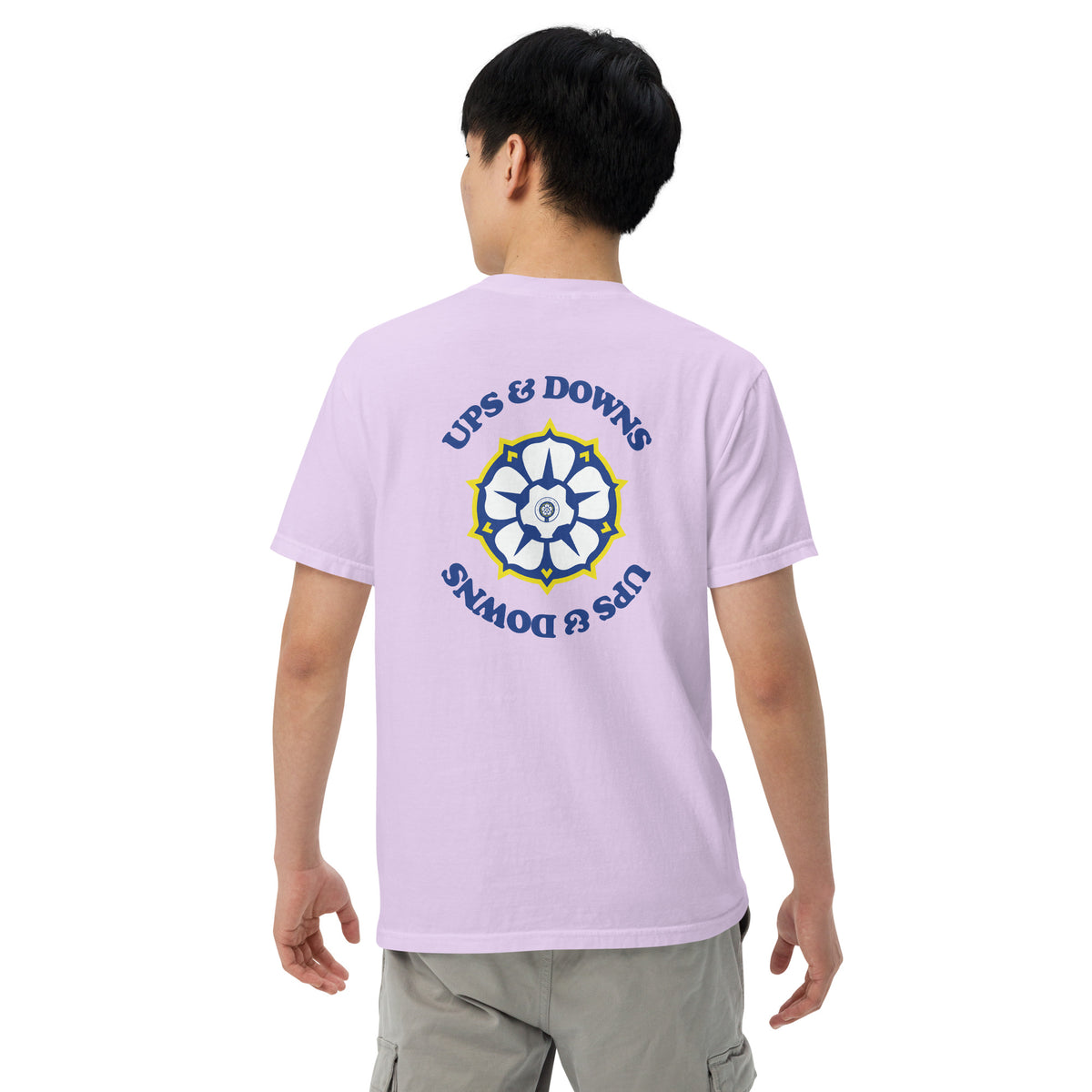 Purple heavyweight t-shirt, back view worn by model with large emblem graphic