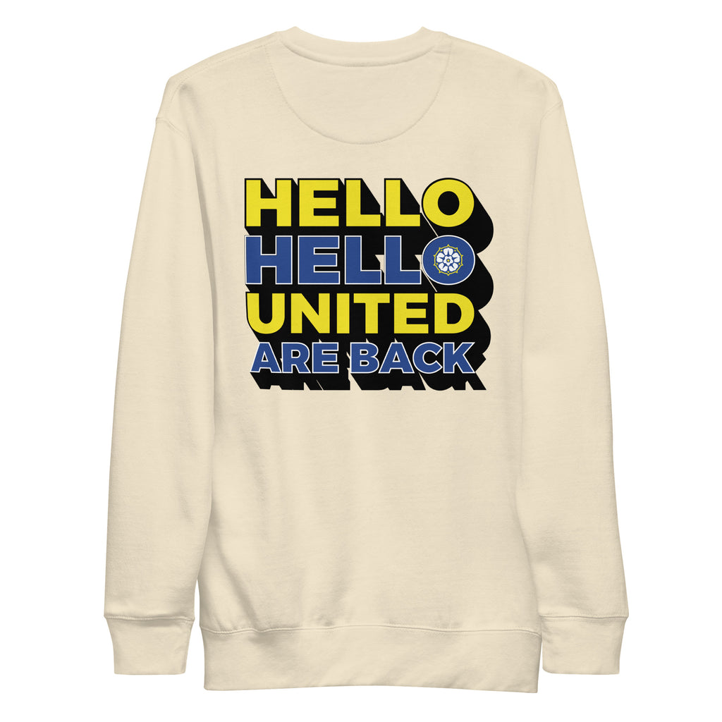 Cream premium sweatshirt with large 'HELLO UNITED ARE BACK' logo on back