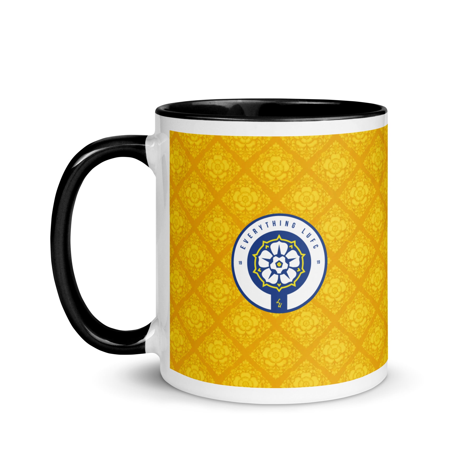 Leeds United away kit mug with yellow pattern, black handle, circular club crest